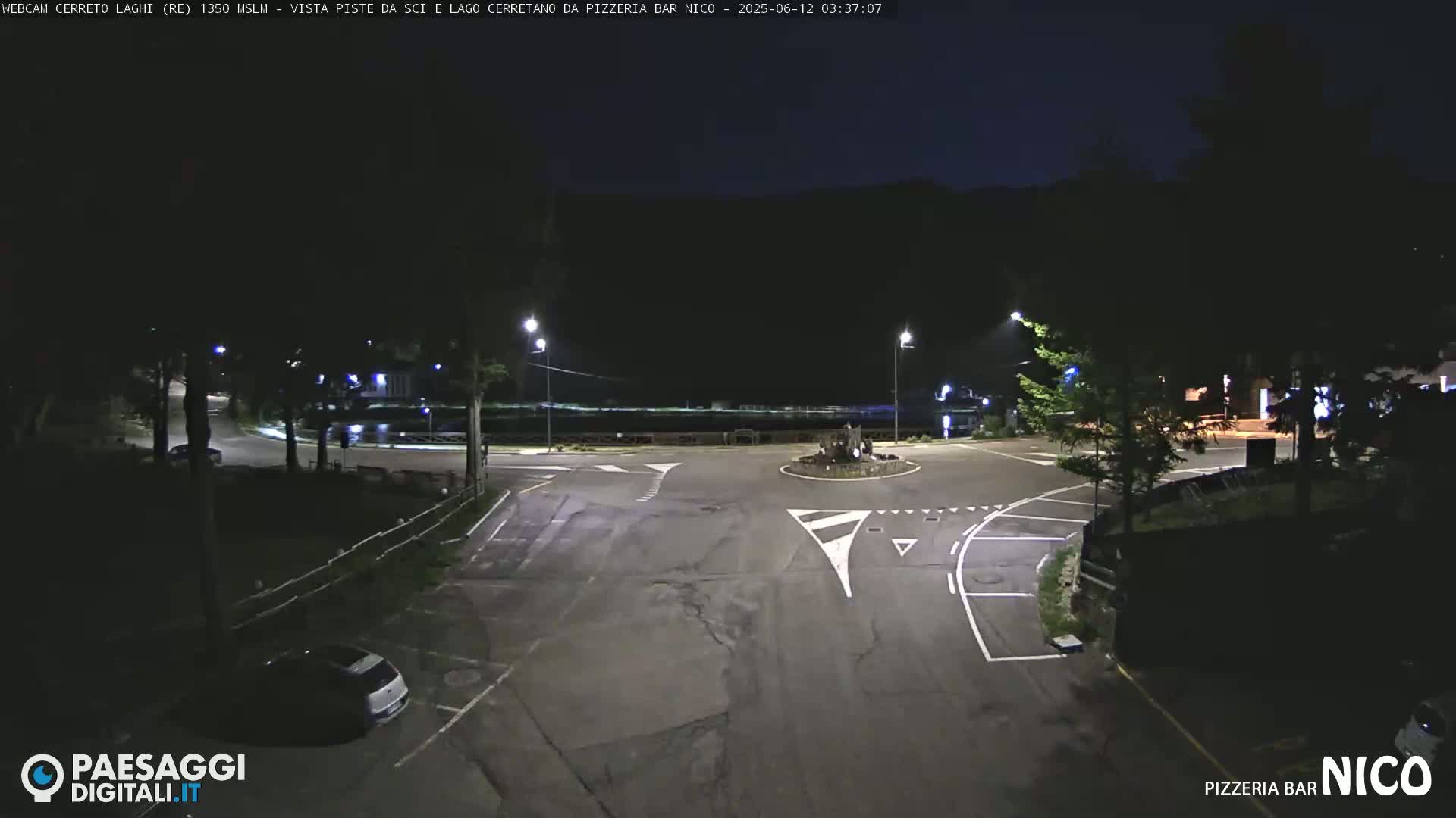  Cerreto Laghi Lake Ski Slopes & Lake's Square Live Cam  - Reggio Emilia, Emilia-Romagna, Italy