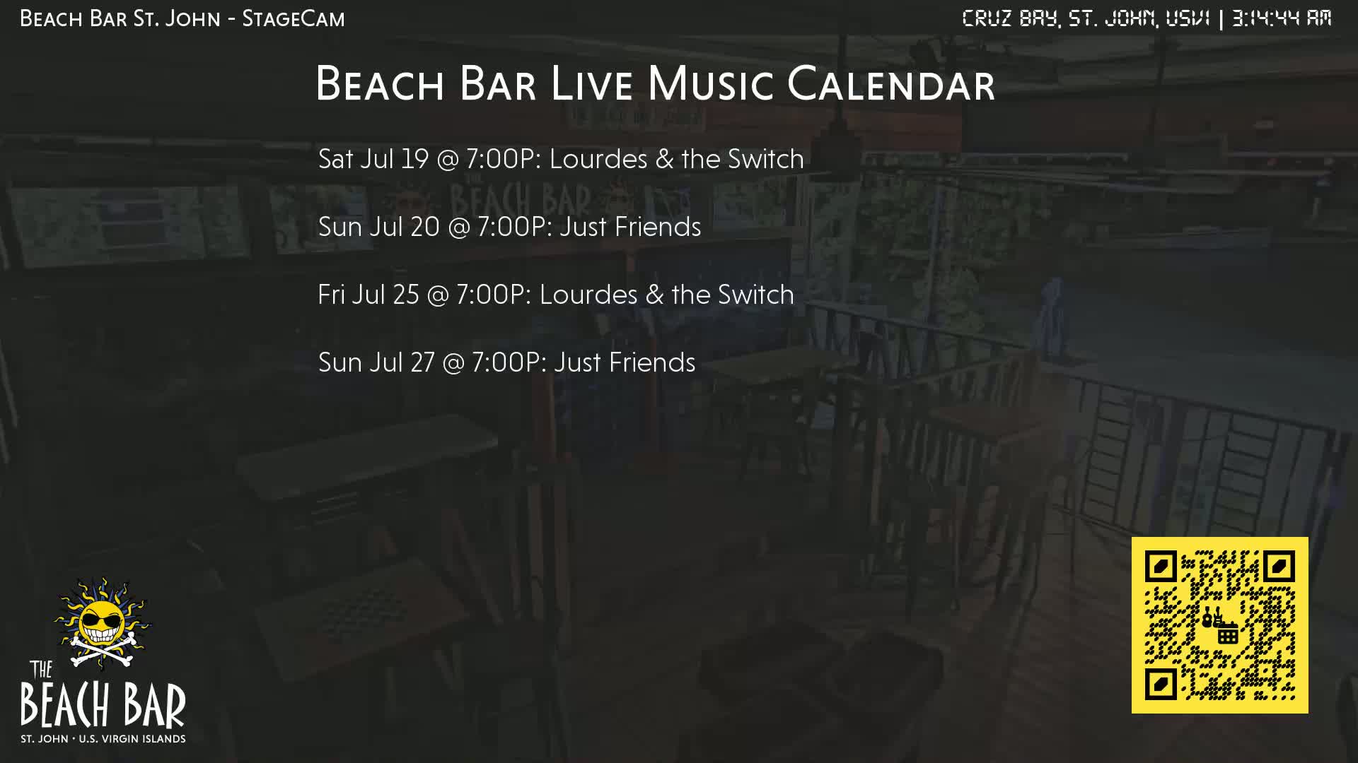 A dimly lit outdoor bar area with empty tables and chairs at night.