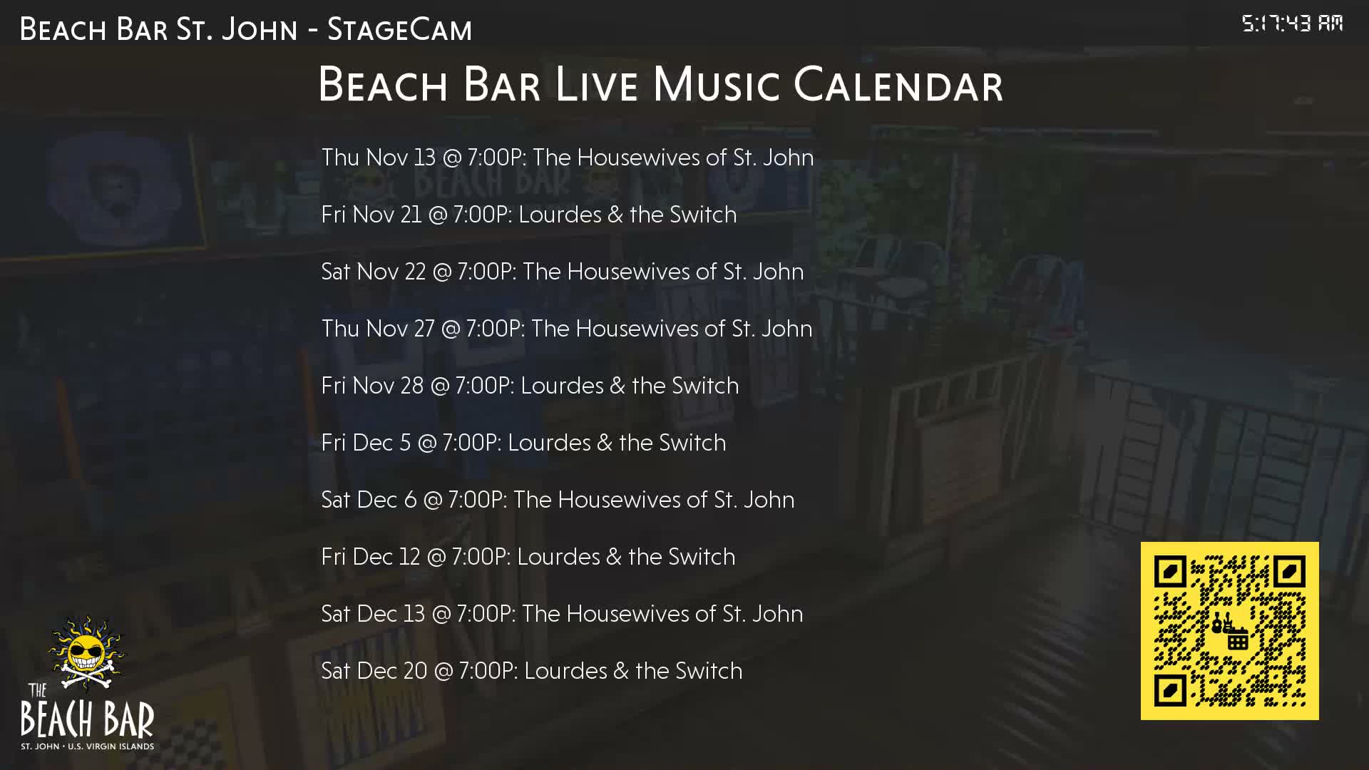 A dimly lit, unoccupied bar area with blurred counters and equipment is visible in the background.