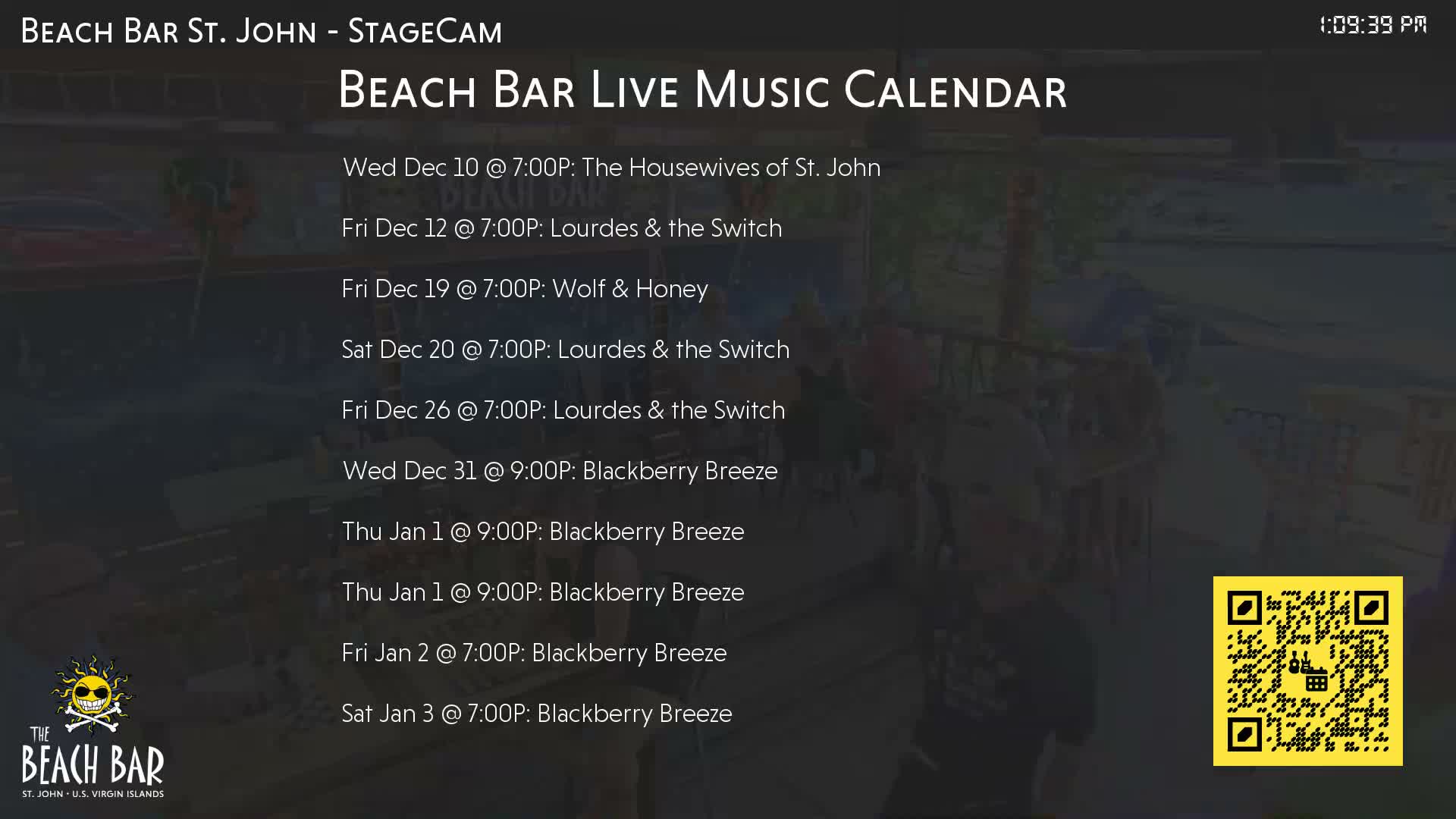 A dark and blurry outdoor patio with railings and indistinct furniture is visible, appearing to be captured at dawn.