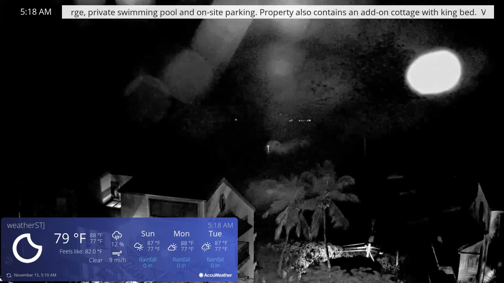 A dark, grainy outdoor scene captured at 5:18 AM with clear 79°F weather reveals a prominent bright orb in the upper right sky, illuminating faint outlines of buildings and palm trees in the foreground and distance.