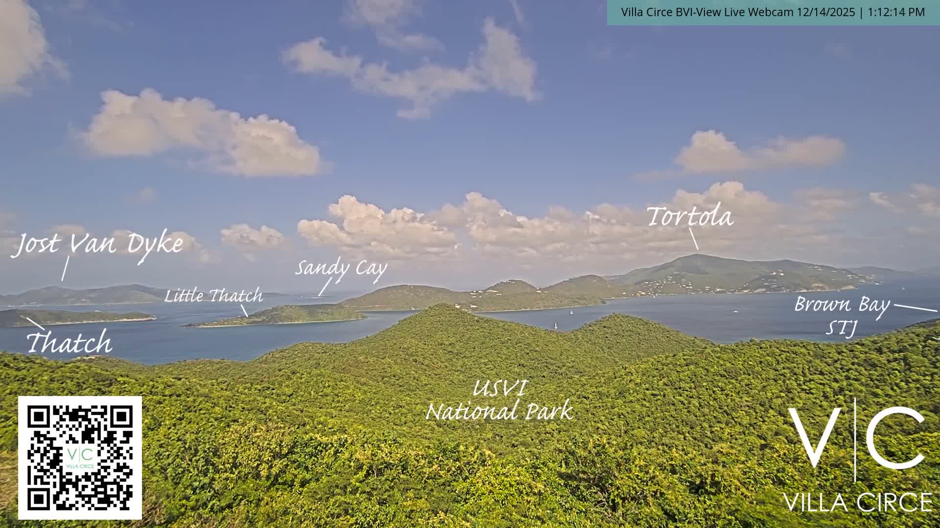 The image depicts a dark nighttime view of distant islands across the water, illuminated by faint lights, under clear weather conditions.