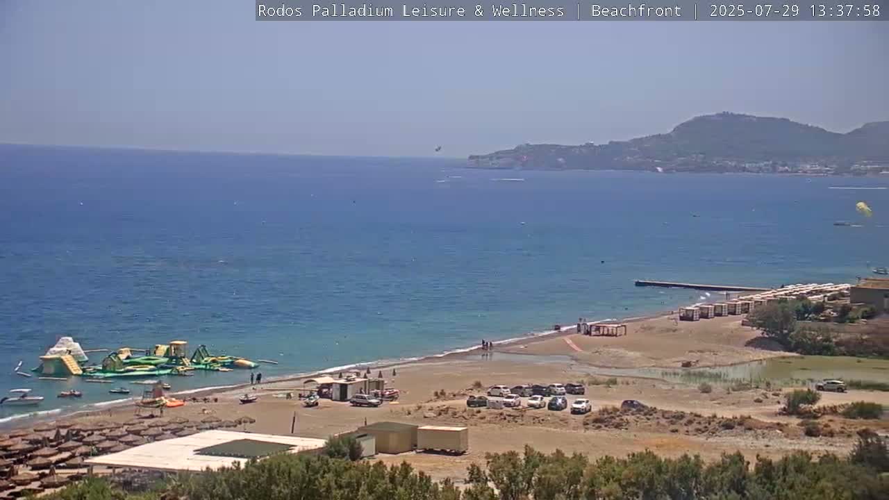 Rhodes, Paralia Faliraki Beach Northeast Live Cam - Ammoudes, Rhodes (Ródos), Dodacanese, South Aegean (Periféreia Notíou Aigaíou), Greece