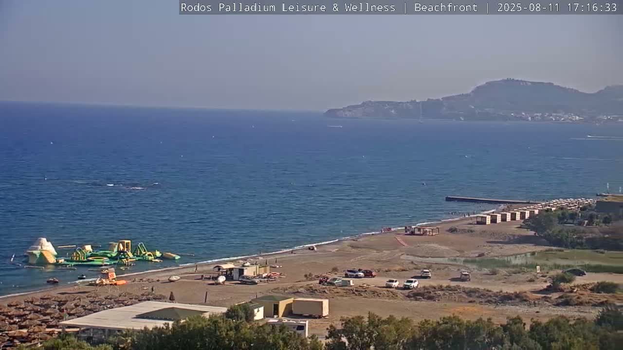 Rhodes, Paralia Faliraki Beach Northeast Live Cam - Ammoudes, Rhodes (Ródos), Dodacanese, South Aegean (Periféreia Notíou Aigaíou), Greece