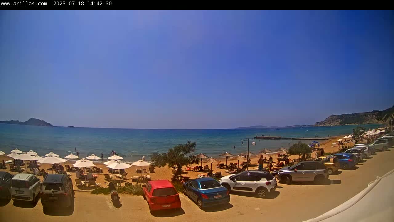 Corfu, Paralia Arillas Beach Live Cam - Arillas Agiou Georgiou, North Corfu (Vóreia Kérkyra), Corfu (Kérkyra), Ionian Islands (Periféreia Ioníon Níson), Greece