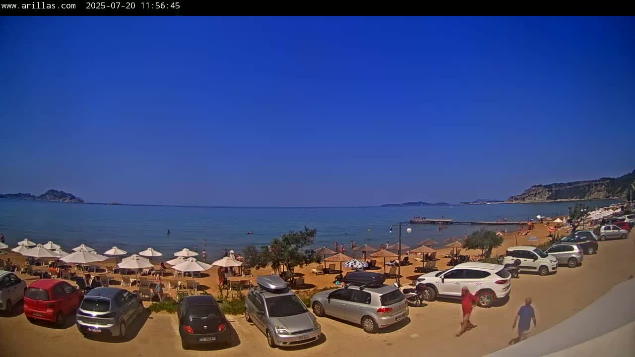 Corfu, Paralia Arillas Beach Live Cam - Arillas Agiou Georgiou, North Corfu (Vóreia Kérkyra), Corfu (Kérkyra), Ionian Islands (Periféreia Ioníon Níson), Greece