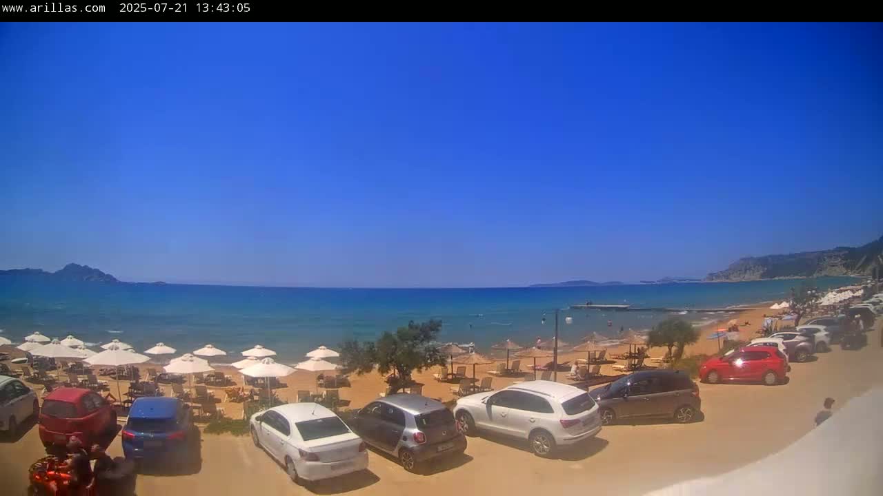 Corfu, Paralia Arillas Beach Live Cam - Arillas Agiou Georgiou, North Corfu (Vóreia Kérkyra), Corfu (Kérkyra), Ionian Islands (Periféreia Ioníon Níson), Greece