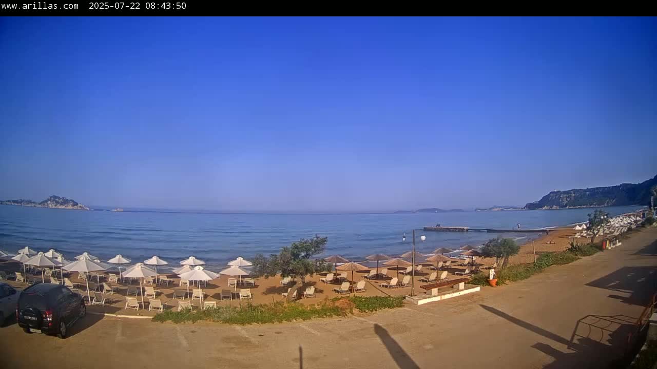 Corfu, Paralia Arillas Beach Live Cam - Arillas Agiou Georgiou, North Corfu (Vóreia Kérkyra), Corfu (Kérkyra), Ionian Islands (Periféreia Ioníon Níson), Greece