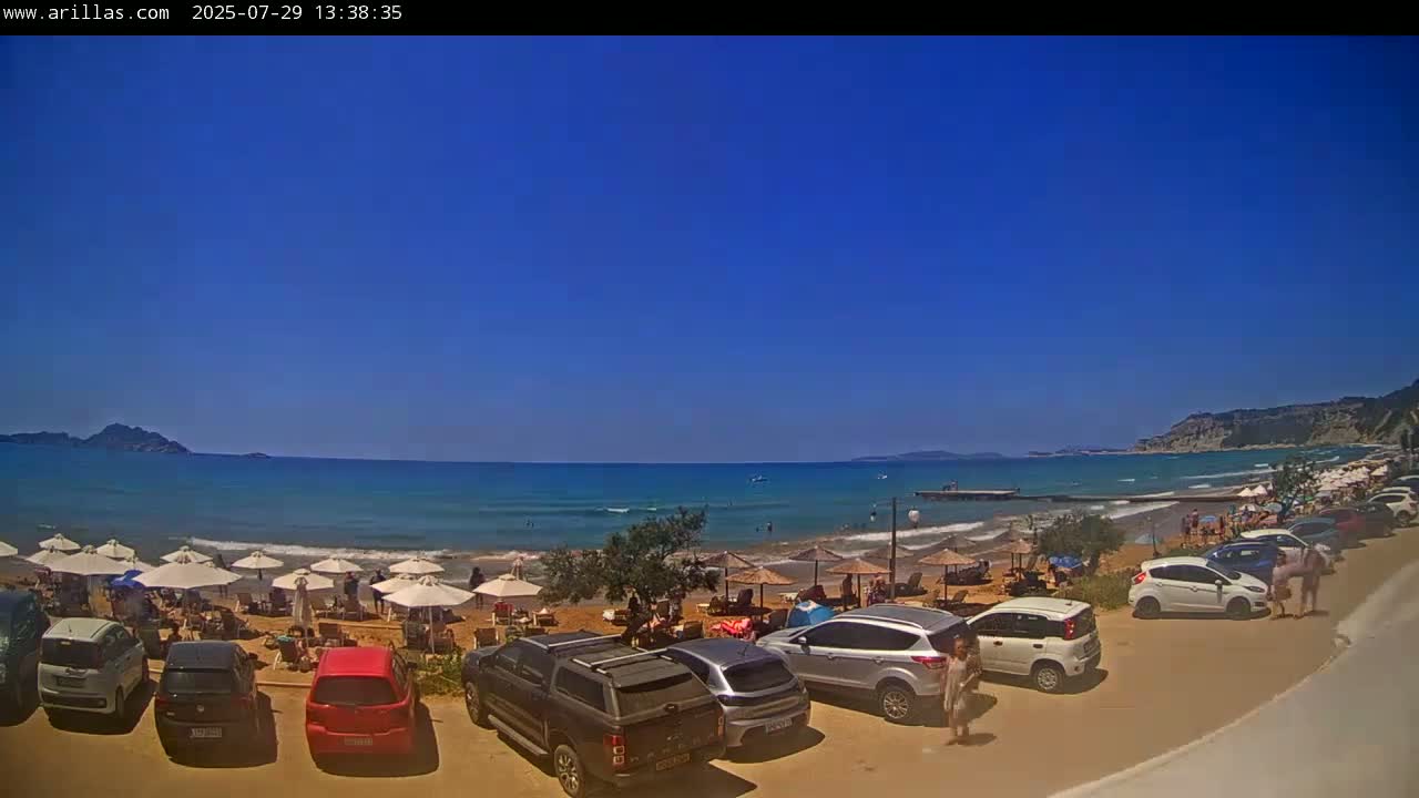 Corfu, Paralia Arillas Beach Live Cam - Arillas Agiou Georgiou, North Corfu (Vóreia Kérkyra), Corfu (Kérkyra), Ionian Islands (Periféreia Ioníon Níson), Greece
