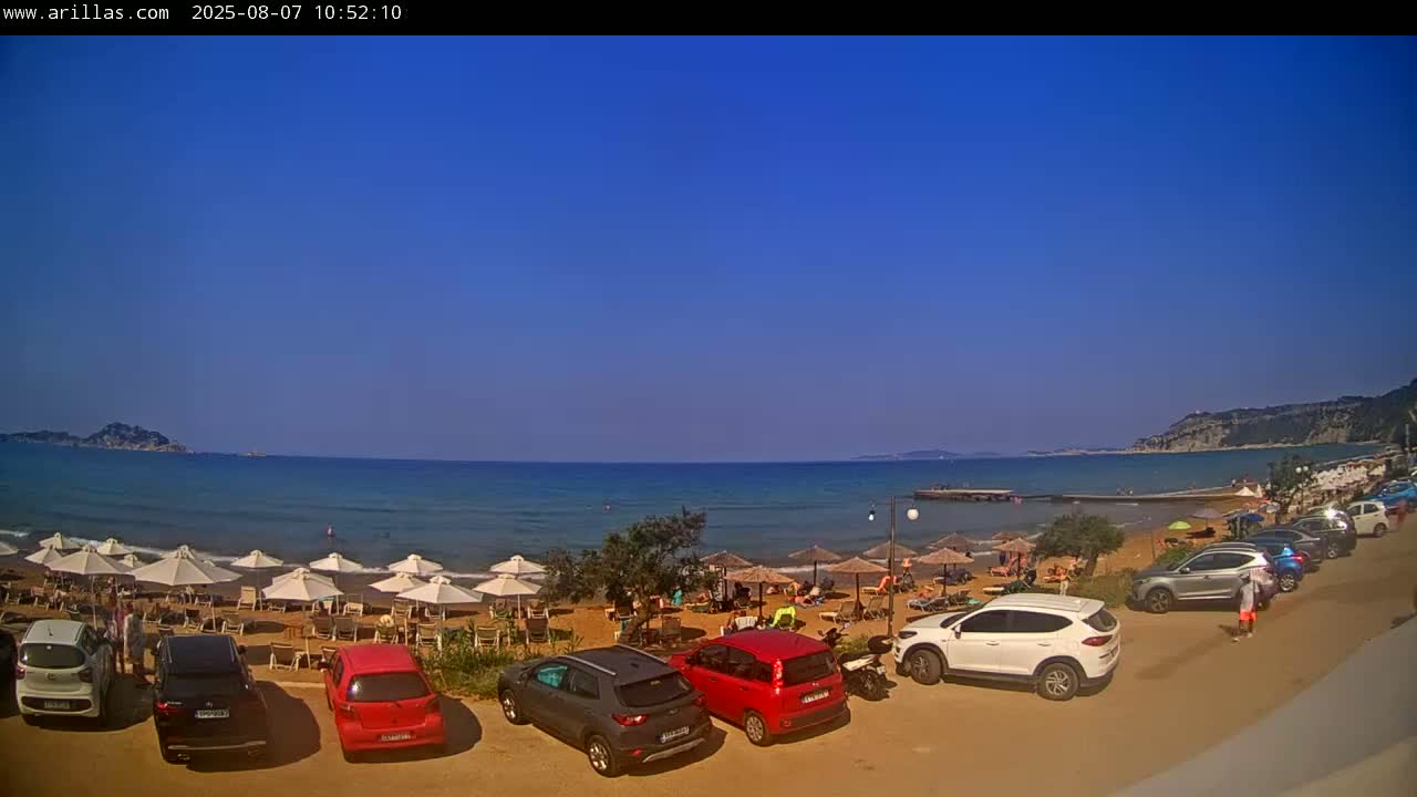 Corfu, Paralia Arillas Beach Live Cam - Arillas Agiou Georgiou, North Corfu (Vóreia Kérkyra), Corfu (Kérkyra), Ionian Islands (Periféreia Ioníon Níson), Greece