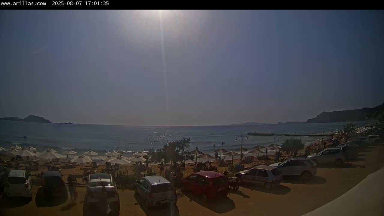 Corfu, Paralia Arillas Beach Live Cam - Arillas Agiou Georgiou, North Corfu (Vóreia Kérkyra), Corfu (Kérkyra), Ionian Islands (Periféreia Ioníon Níson), Greece