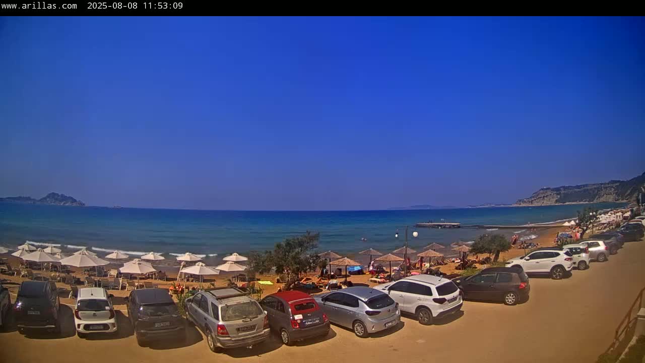 Corfu, Paralia Arillas Beach Live Cam - Arillas Agiou Georgiou, North Corfu (Vóreia Kérkyra), Corfu (Kérkyra), Ionian Islands (Periféreia Ioníon Níson), Greece