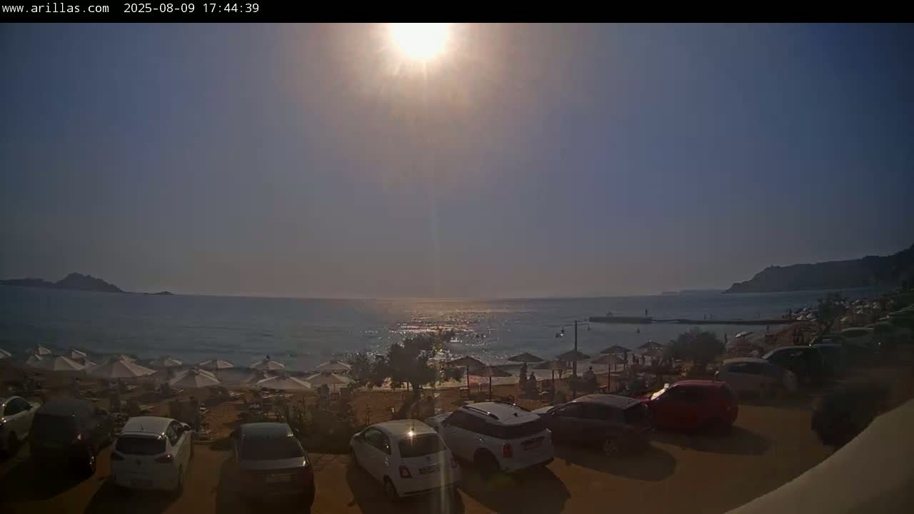 Corfu, Paralia Arillas Beach Live Cam - Arillas Agiou Georgiou, North Corfu (Vóreia Kérkyra), Corfu (Kérkyra), Ionian Islands (Periféreia Ioníon Níson), Greece