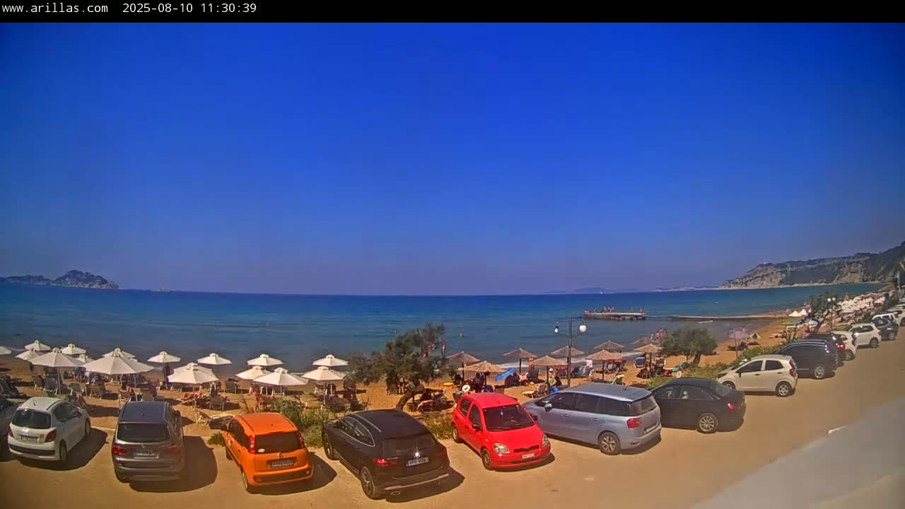 Corfu, Paralia Arillas Beach Live Cam - Arillas Agiou Georgiou, North Corfu (Vóreia Kérkyra), Corfu (Kérkyra), Ionian Islands (Periféreia Ioníon Níson), Greece