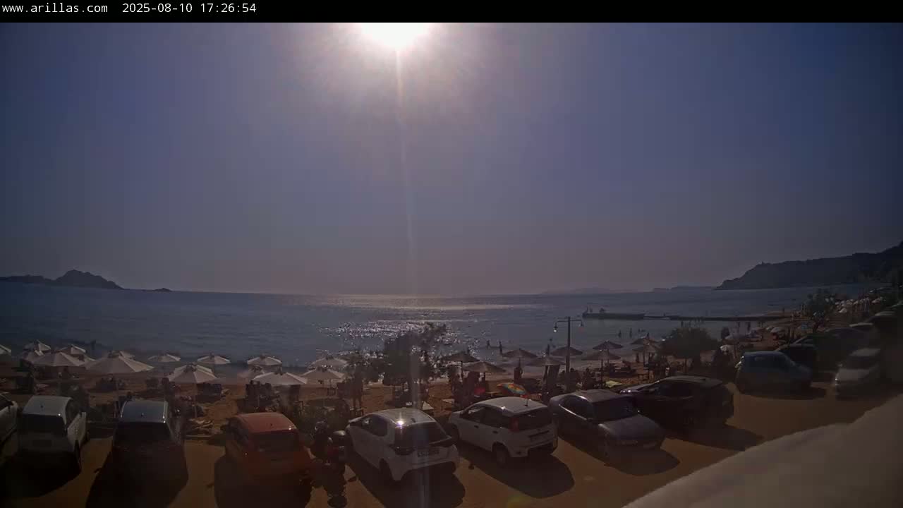 Corfu, Paralia Arillas Beach Live Cam - Arillas Agiou Georgiou, North Corfu (Vóreia Kérkyra), Corfu (Kérkyra), Ionian Islands (Periféreia Ioníon Níson), Greece