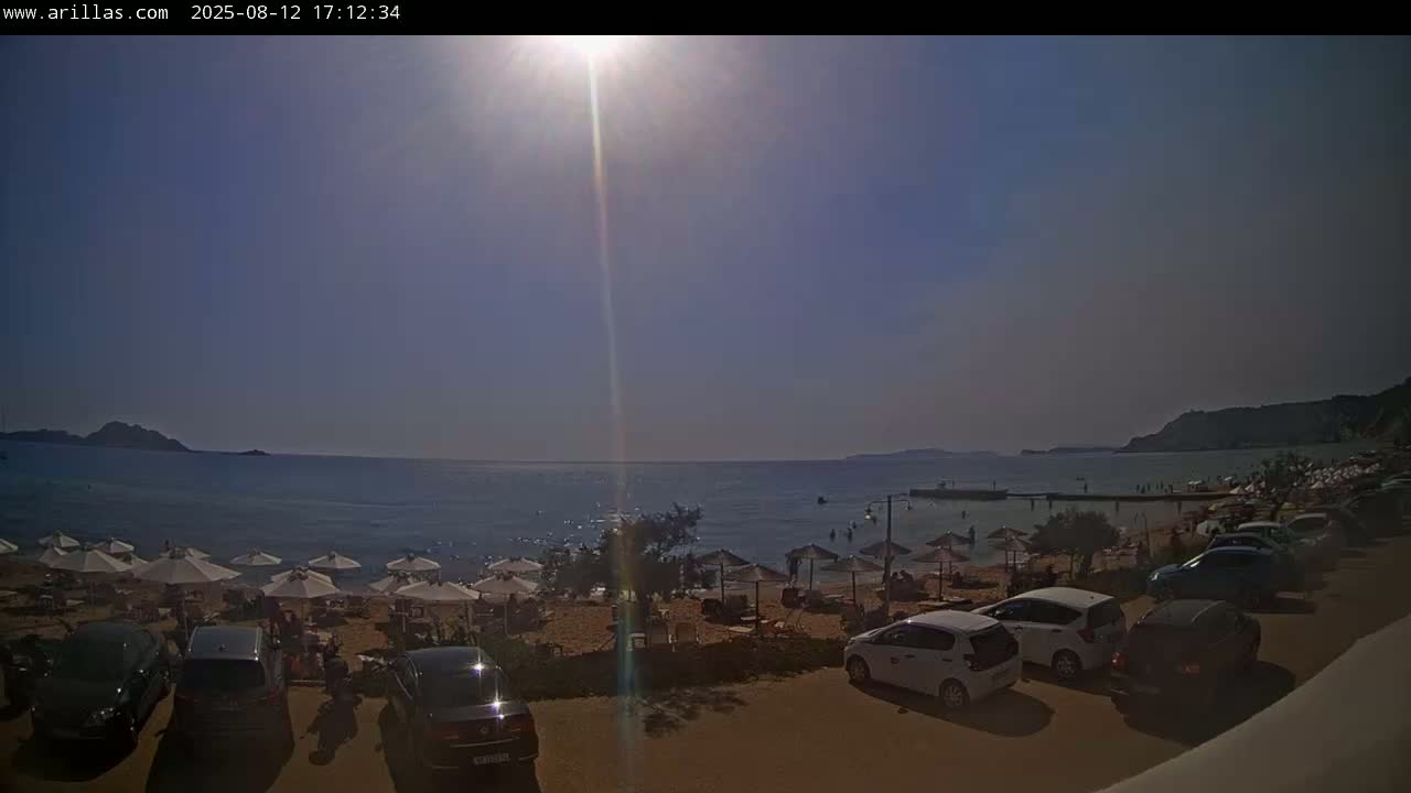 Corfu, Paralia Arillas Beach Live Cam - Arillas Agiou Georgiou, North Corfu (Vóreia Kérkyra), Corfu (Kérkyra), Ionian Islands (Periféreia Ioníon Níson), Greece