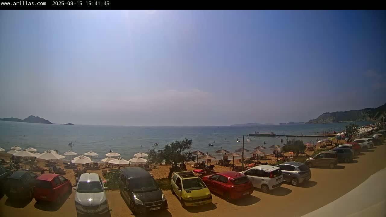 Corfu, Paralia Arillas Beach Live Cam - Arillas Agiou Georgiou, North Corfu (Vóreia Kérkyra), Corfu (Kérkyra), Ionian Islands (Periféreia Ioníon Níson), Greece