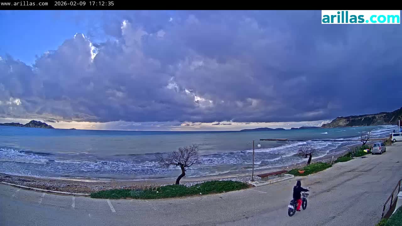 Corfu, Paralia Arillas Beach Live Cam - Arillas Agiou Georgiou, North Corfu (Vóreia Kérkyra), Corfu (Kérkyra), Ionian Islands (Periféreia Ioníon Níson), Greece