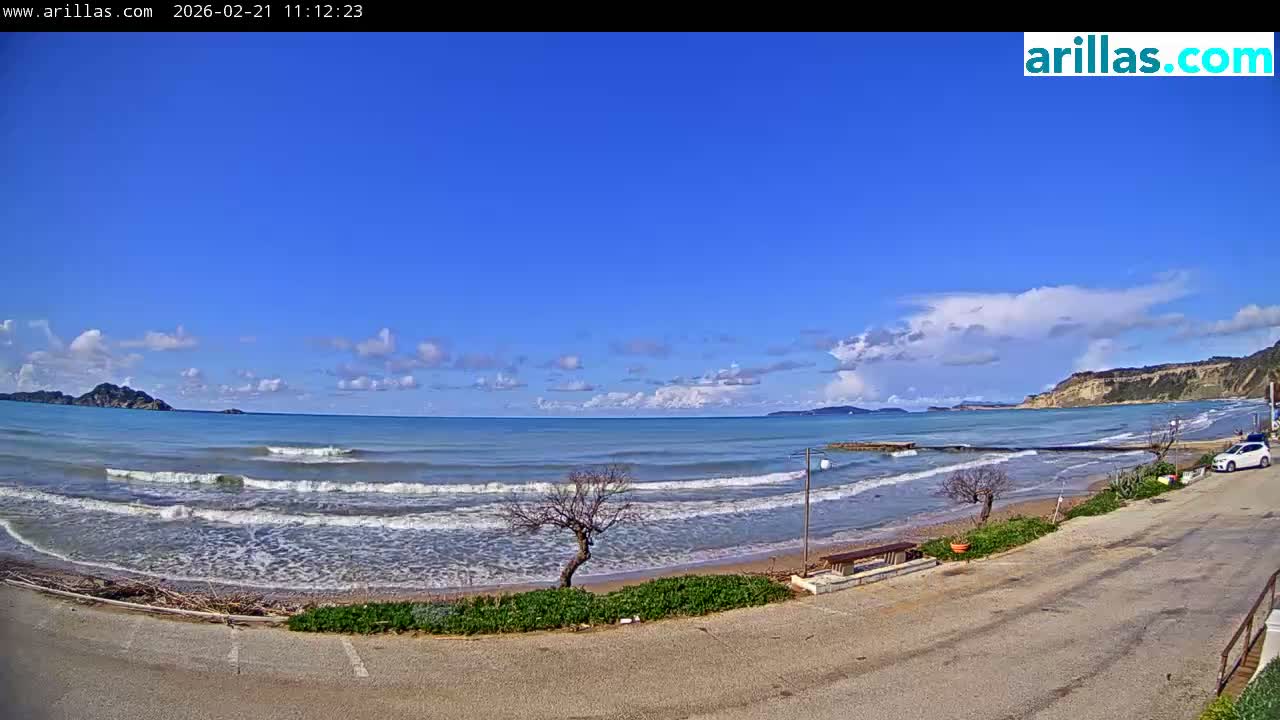 Corfu, Paralia Arillas Beach Live Cam - Arillas Agiou Georgiou, North Corfu (Vóreia Kérkyra), Corfu (Kérkyra), Ionian Islands (Periféreia Ioníon Níson), Greece
