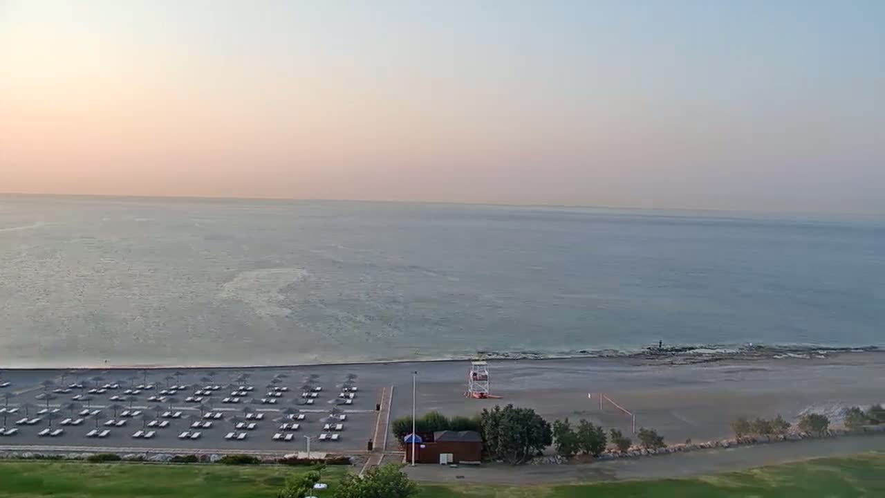 Rhodes, Paralia Faliraki Beach Northeast End Live Cam - Ammoudes, Rhodes (Ródos), Dodacanese,  South Aegean (Periféreia Notíou Aigaíou), Greece