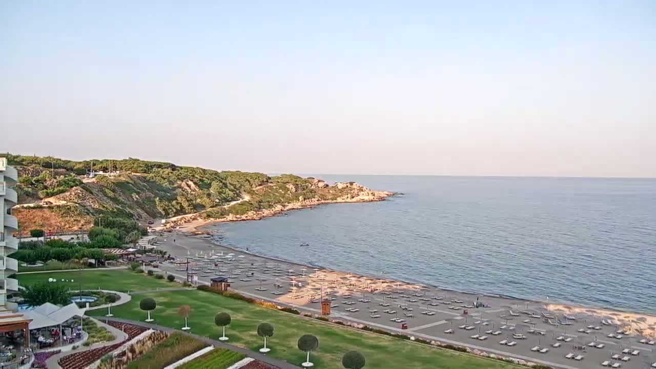 Rhodes, Paralia Faliraki Beach Northeast End Live Cam - Ammoudes, Rhodes (Ródos), Dodacanese,  South Aegean (Periféreia Notíou Aigaíou), Greece