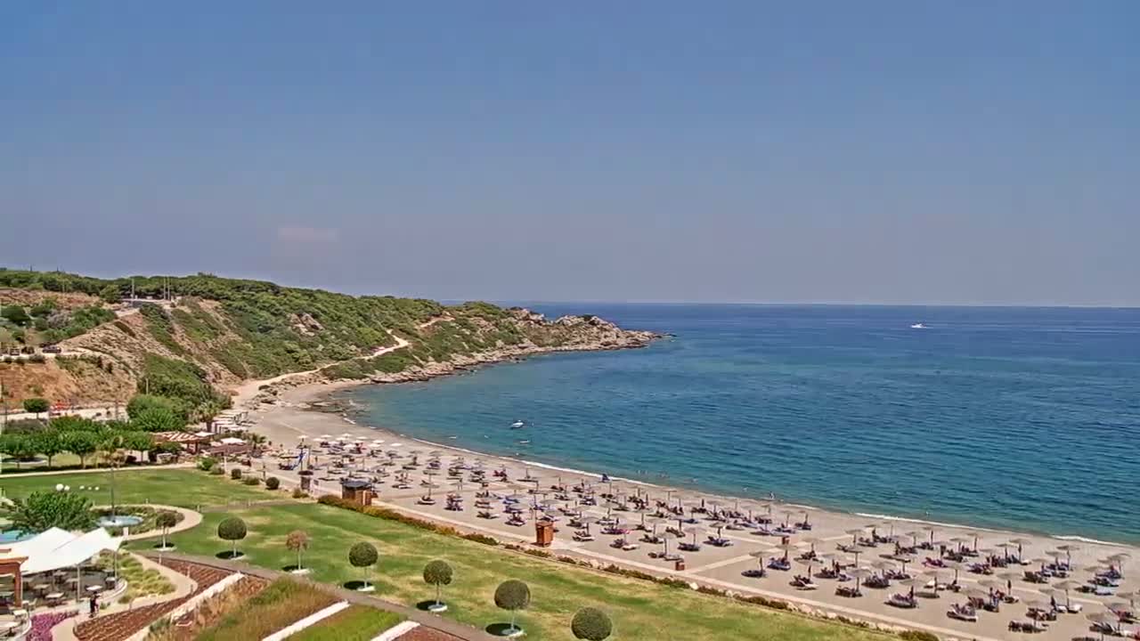 Rhodes, Paralia Faliraki Beach Northeast End Live Cam - Ammoudes, Rhodes (Ródos), Dodacanese,  South Aegean (Periféreia Notíou Aigaíou), Greece