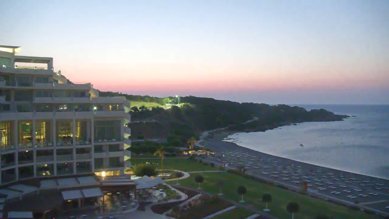 Rhodes, Paralia Faliraki Beach Northeast End Live Cam - Ammoudes, Rhodes (Ródos), Dodacanese,  South Aegean (Periféreia Notíou Aigaíou), Greece