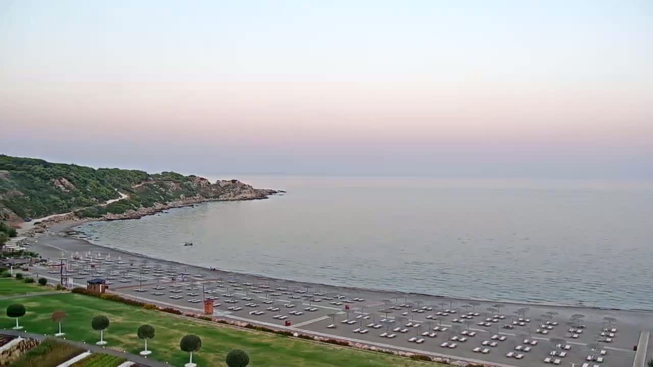 Rhodes, Paralia Faliraki Beach Northeast End Live Cam - Ammoudes, Rhodes (Ródos), Dodacanese,  South Aegean (Periféreia Notíou Aigaíou), Greece