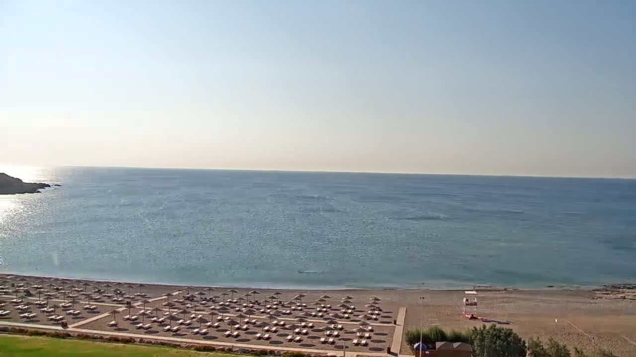 Rhodes, Paralia Faliraki Beach Northeast End Live Cam - Ammoudes, Rhodes (Ródos), Dodacanese,  South Aegean (Periféreia Notíou Aigaíou), Greece