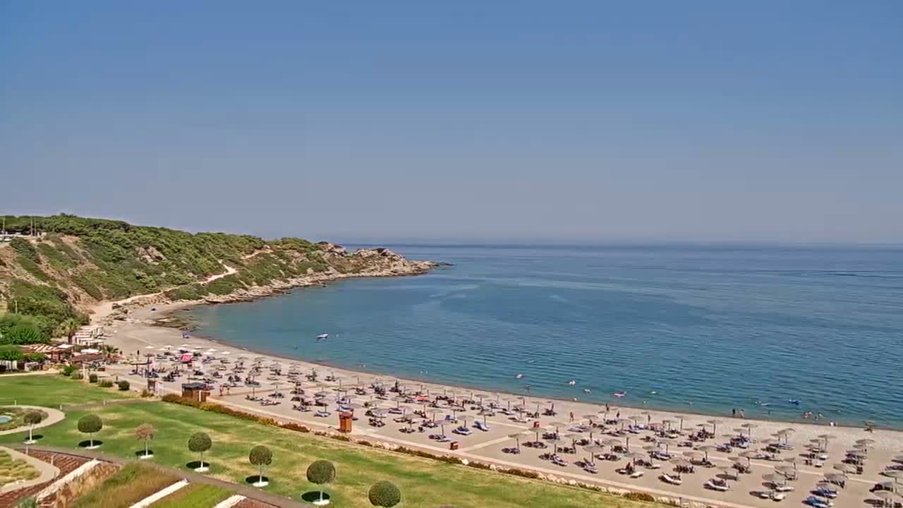 Rhodes, Paralia Faliraki Beach Northeast End Live Cam - Ammoudes, Rhodes (Ródos), Dodacanese,  South Aegean (Periféreia Notíou Aigaíou), Greece