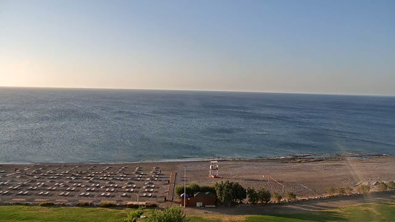 Rhodes, Paralia Faliraki Beach Northeast End Live Cam - Ammoudes, Rhodes (Ródos), Dodacanese,  South Aegean (Periféreia Notíou Aigaíou), Greece