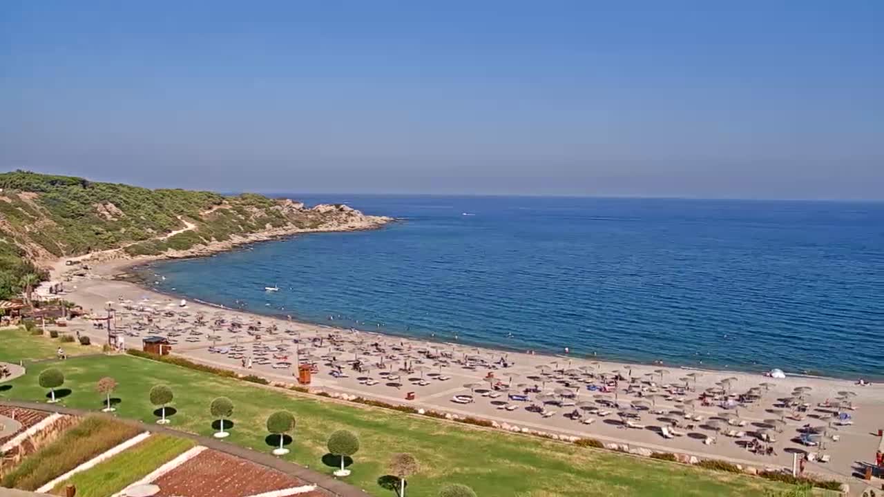 Rhodes, Paralia Faliraki Beach Northeast End Live Cam - Ammoudes, Rhodes (Ródos), Dodacanese,  South Aegean (Periféreia Notíou Aigaíou), Greece
