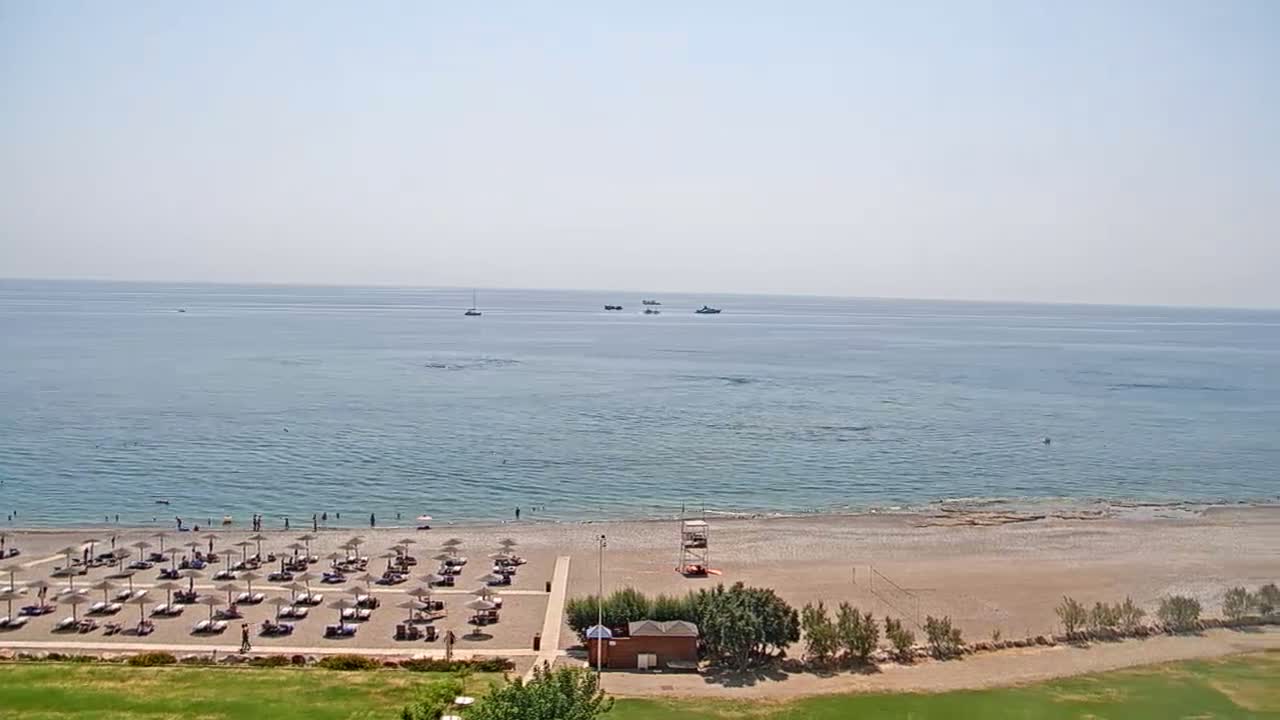 Rhodes, Paralia Faliraki Beach Northeast End Live Cam - Ammoudes, Rhodes (Ródos), Dodacanese,  South Aegean (Periféreia Notíou Aigaíou), Greece