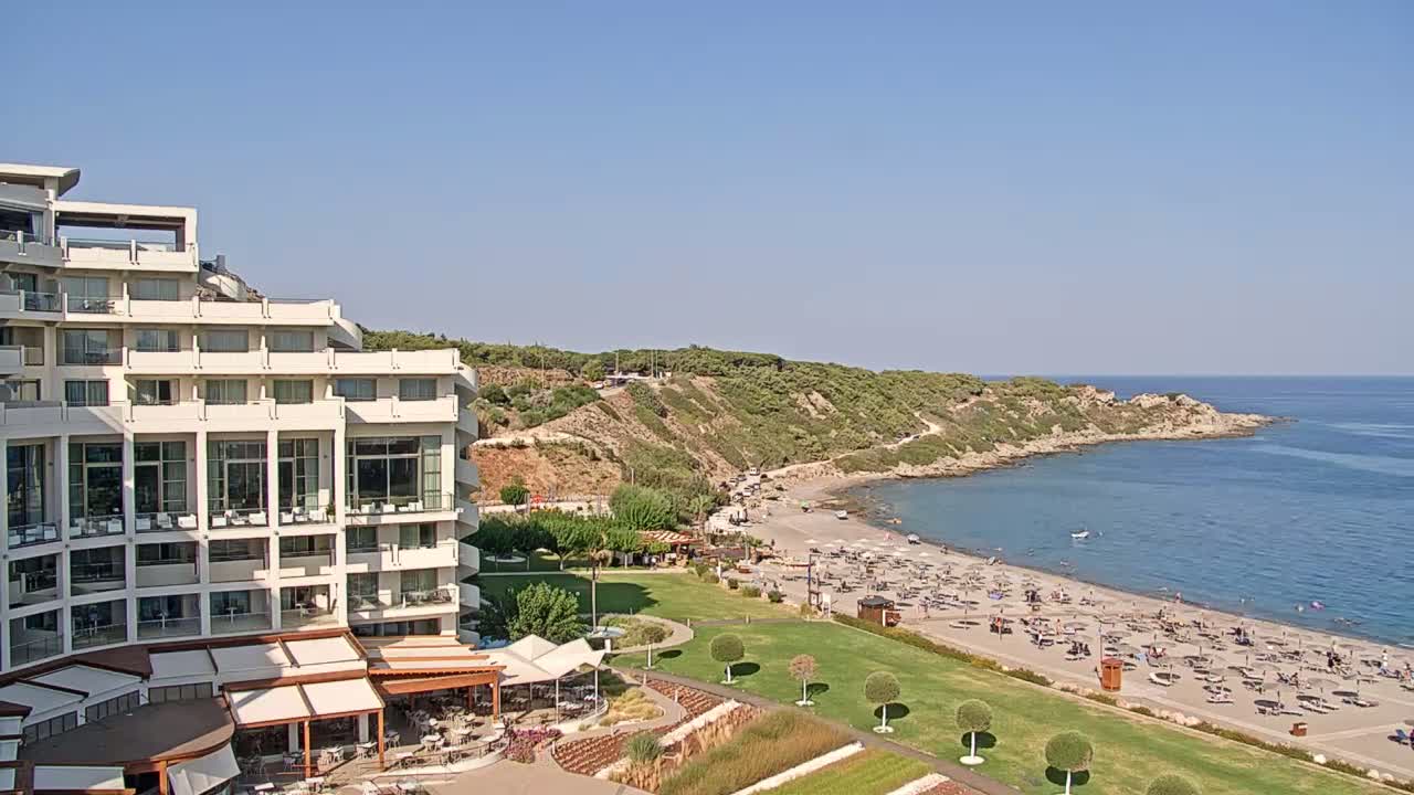 Rhodes, Paralia Faliraki Beach Northeast End Live Cam - Ammoudes, Rhodes (Ródos), Dodacanese,  South Aegean (Periféreia Notíou Aigaíou), Greece
