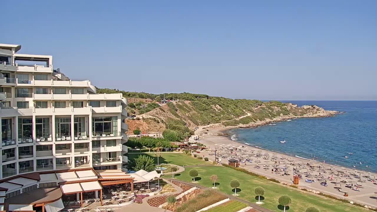Rhodes, Paralia Faliraki Beach Northeast End Live Cam - Ammoudes, Rhodes (Ródos), Dodacanese,  South Aegean (Periféreia Notíou Aigaíou), Greece