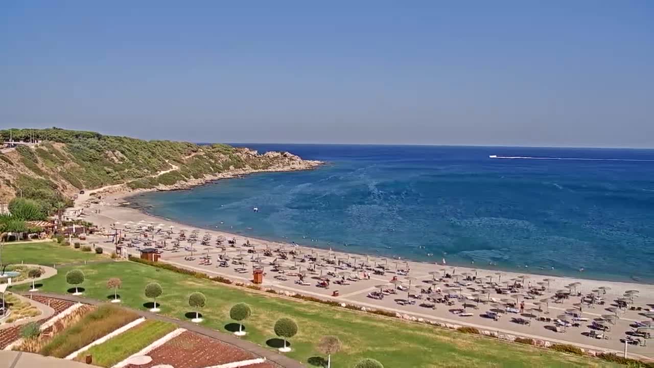 Rhodes, Paralia Faliraki Beach Northeast End Live Cam - Ammoudes, Rhodes (Ródos), Dodacanese,  South Aegean (Periféreia Notíou Aigaíou), Greece