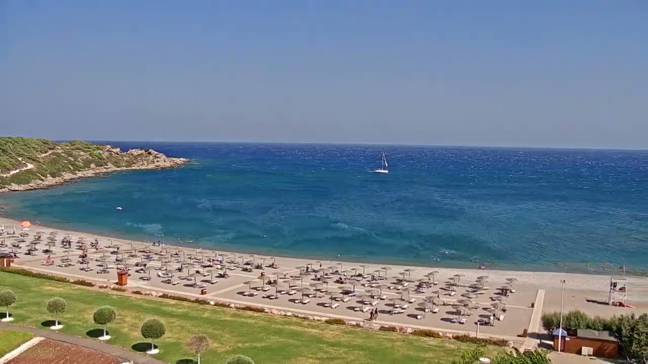 Rhodes, Paralia Faliraki Beach Northeast End Live Cam - Ammoudes, Rhodes (Ródos), Dodacanese,  South Aegean (Periféreia Notíou Aigaíou), Greece