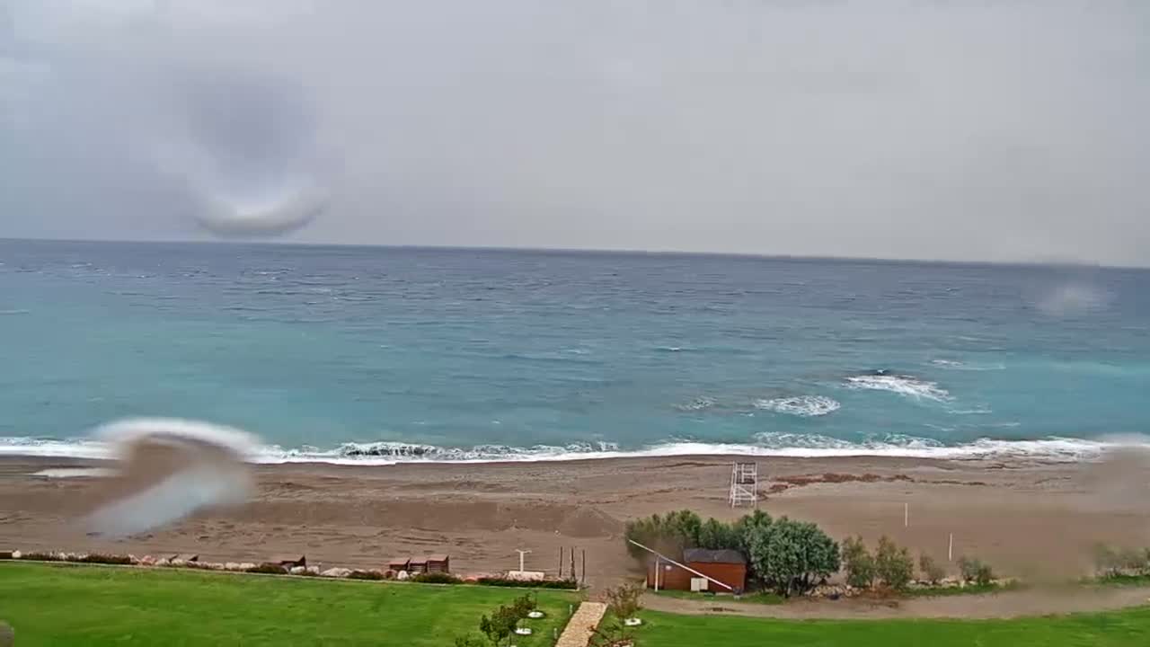 Rhodes, Paralia Faliraki Beach Northeast End Live Cam - Ammoudes, Rhodes (Ródos), Dodacanese,  South Aegean (Periféreia Notíou Aigaíou), Greece