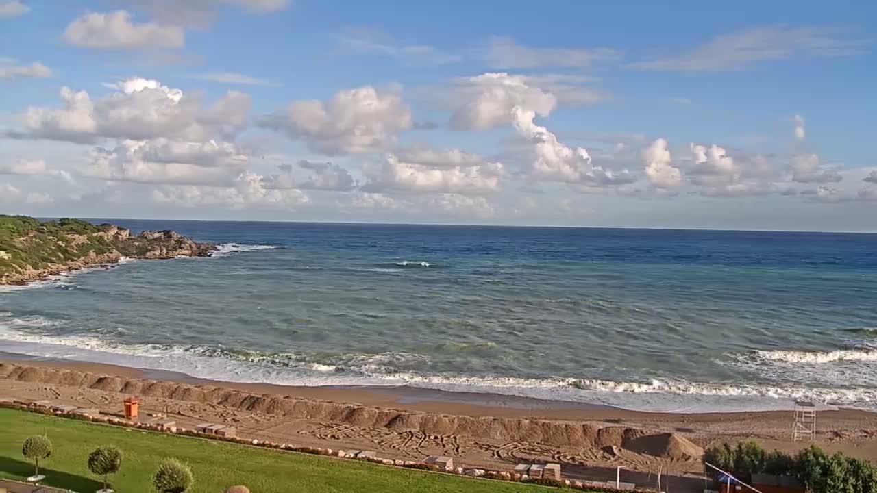 Rhodes, Paralia Faliraki Beach Northeast End Live Cam - Ammoudes, Rhodes (Ródos), Dodacanese,  South Aegean (Periféreia Notíou Aigaíou), Greece