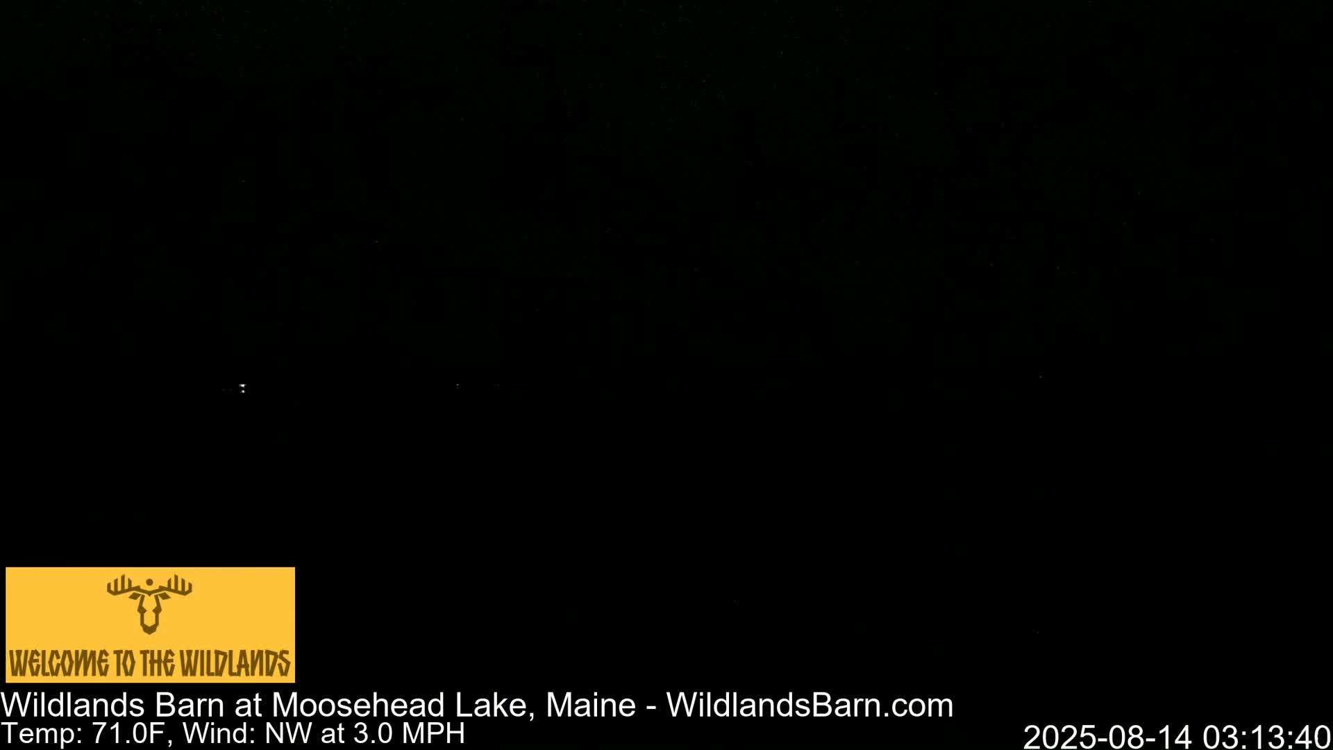 A nighttime image shows a dark scene with a few faint lights in the distance, under clear skies with a 71°F temperature and a 3 mph northwest wind.