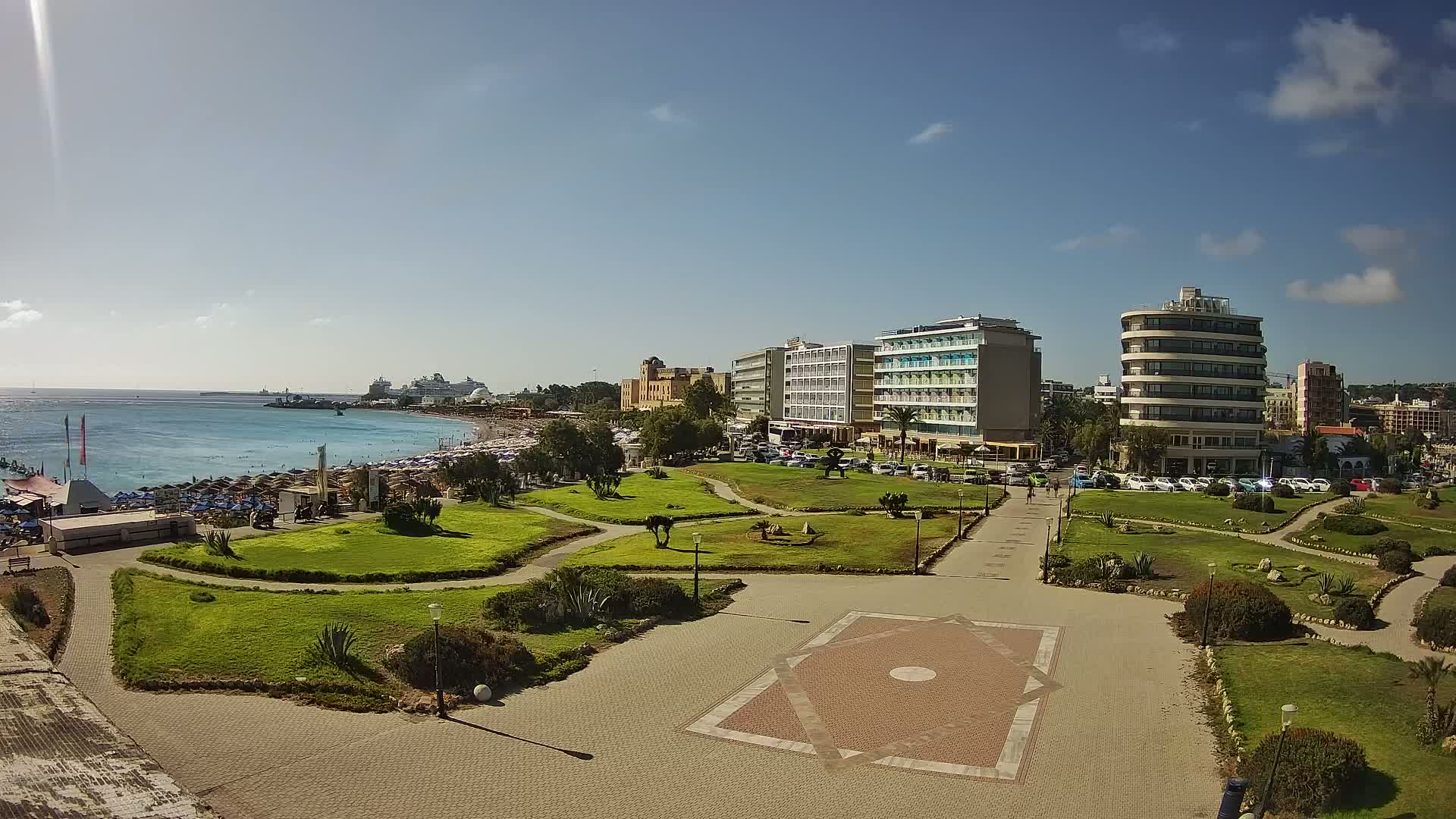 Rhodes, Paralia Enidriou Beach & Platia Enidriou Plaza Live Cam - Elli Beach, Rhodes (Ródos), Dodacanese, South Aegean (Periféreia Notíou Aigaíou), Greece