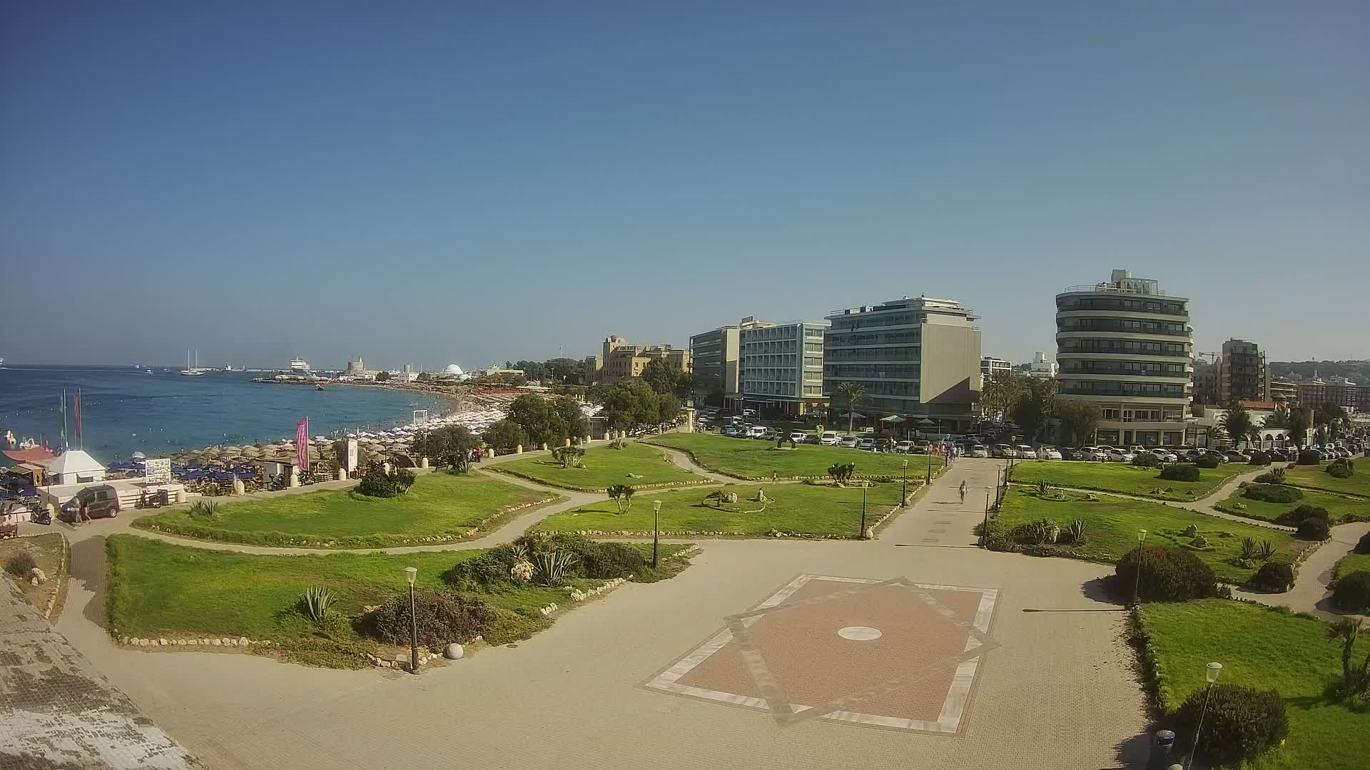 Rhodes, Paralia Enidriou Beach & Platia Enidriou Plaza Live Cam - Elli Beach, Rhodes (Ródos), Dodacanese, South Aegean (Periféreia Notíou Aigaíou), Greece