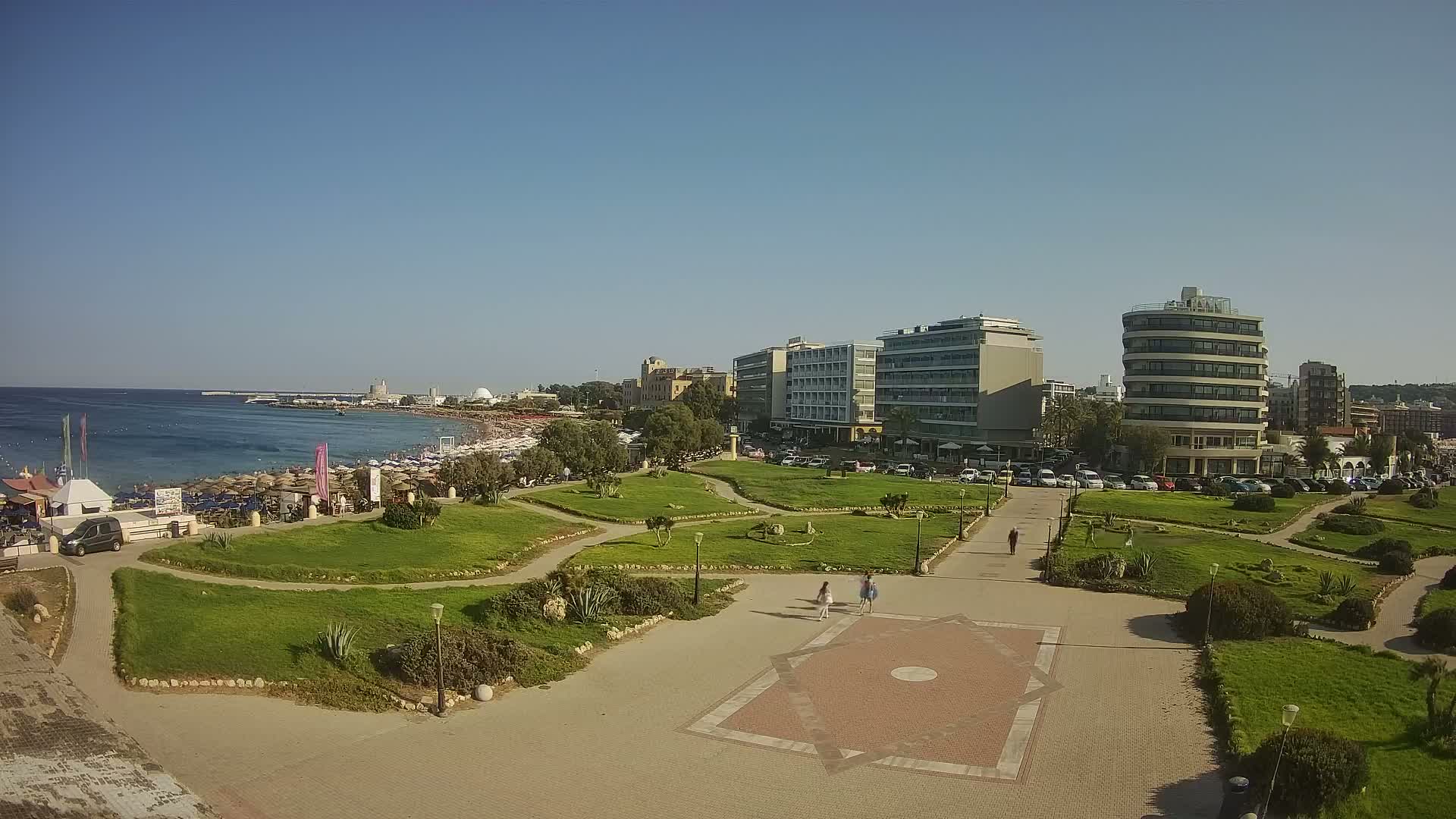 Rhodes, Paralia Enidriou Beach & Platia Enidriou Plaza Live Cam - Elli Beach, Rhodes (Ródos), Dodacanese, South Aegean (Periféreia Notíou Aigaíou), Greece