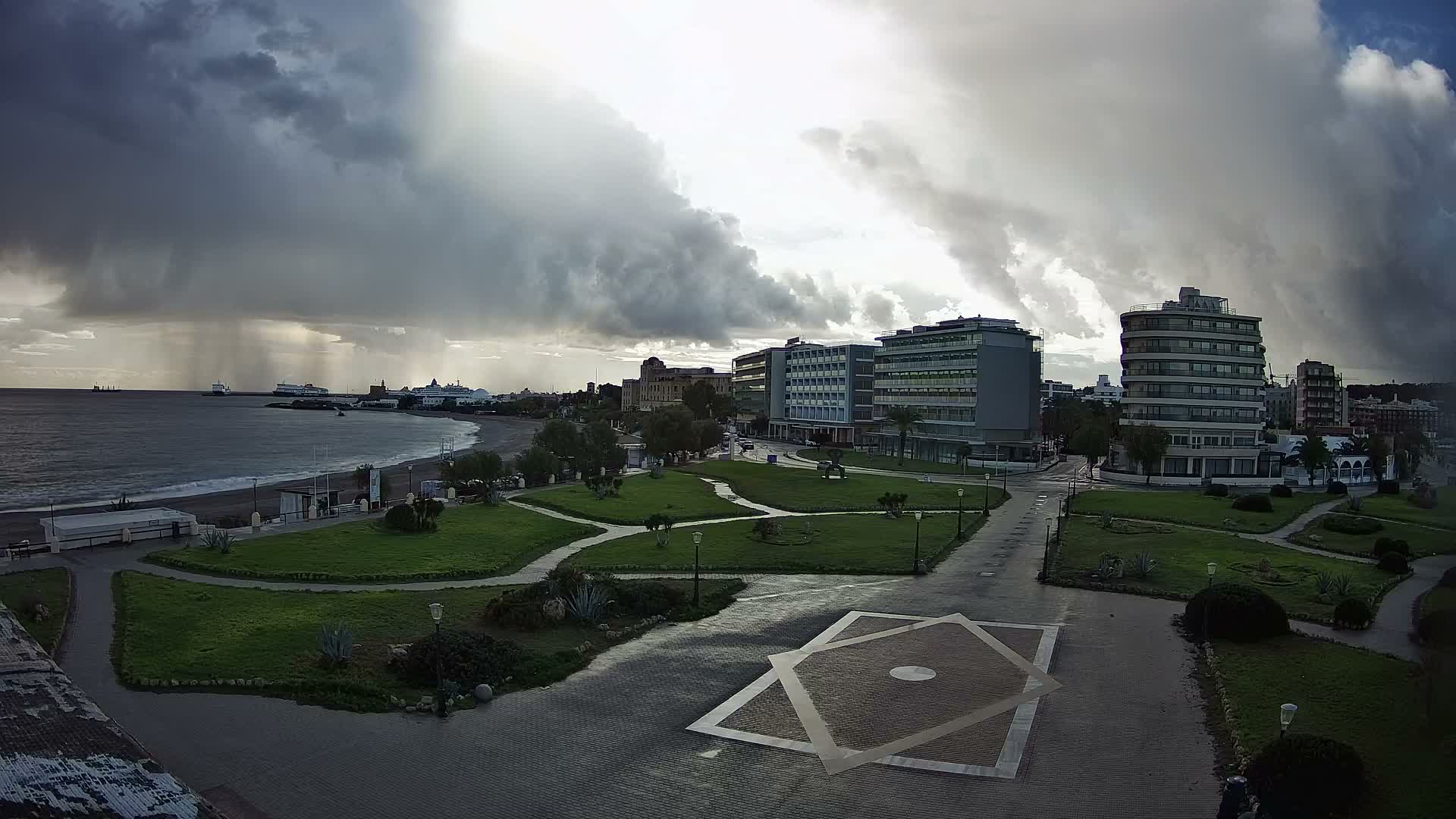 Rhodes, Paralia Enidriou Beach & Platia Enidriou Plaza Live Cam - Elli Beach, Rhodes (Ródos), Dodacanese, South Aegean (Periféreia Notíou Aigaíou), Greece