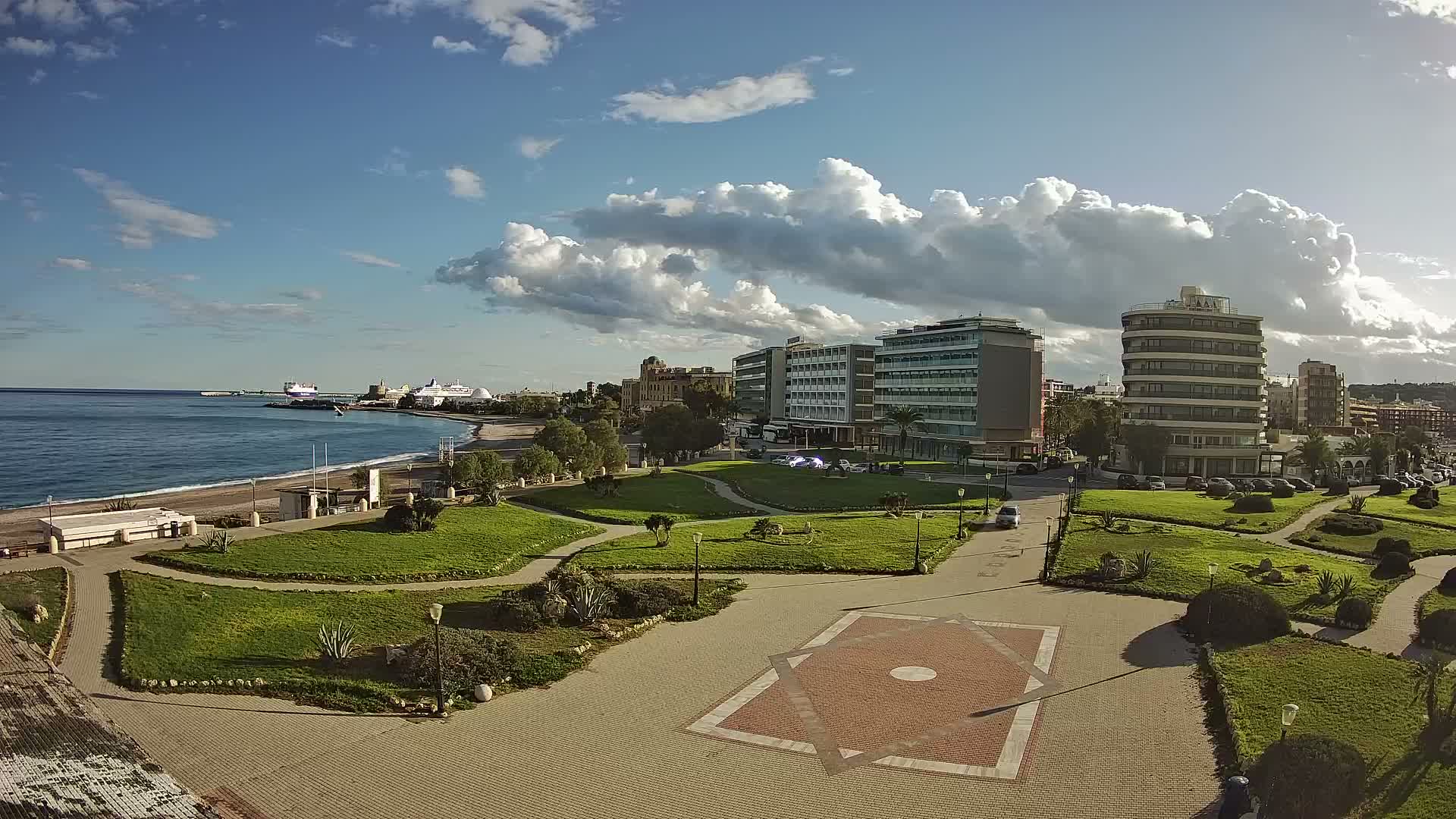 Rhodes, Paralia Enidriou Beach & Platia Enidriou Plaza Live Cam - Elli Beach, Rhodes (Ródos), Dodacanese, South Aegean (Periféreia Notíou Aigaíou), Greece