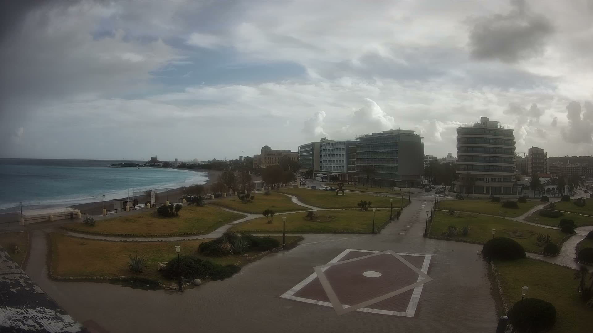 Rhodes, Paralia Enidriou Beach & Platia Enidriou Plaza Live Cam - Elli Beach, Rhodes (Ródos), Dodacanese, South Aegean (Periféreia Notíou Aigaíou), Greece