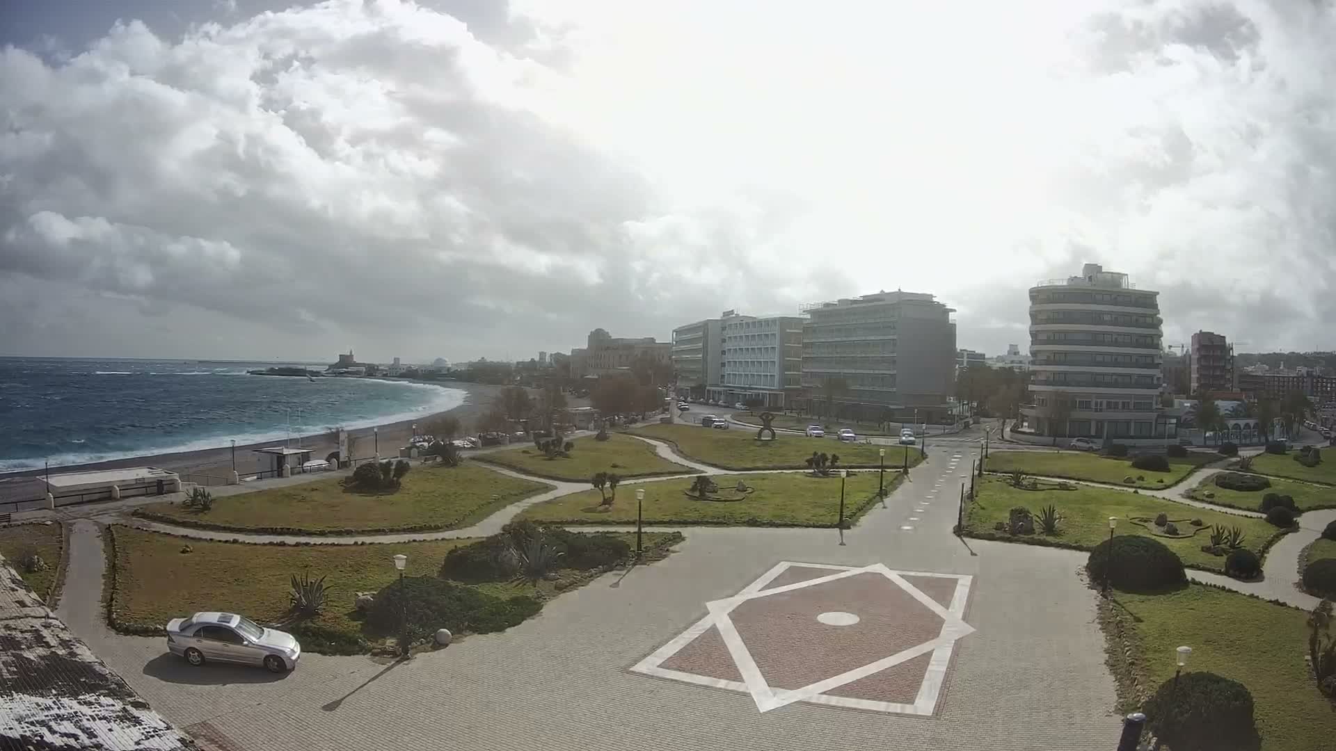 Rhodes, Paralia Enidriou Beach & Platia Enidriou Plaza Live Cam - Elli Beach, Rhodes (Ródos), Dodacanese, South Aegean (Periféreia Notíou Aigaíou), Greece