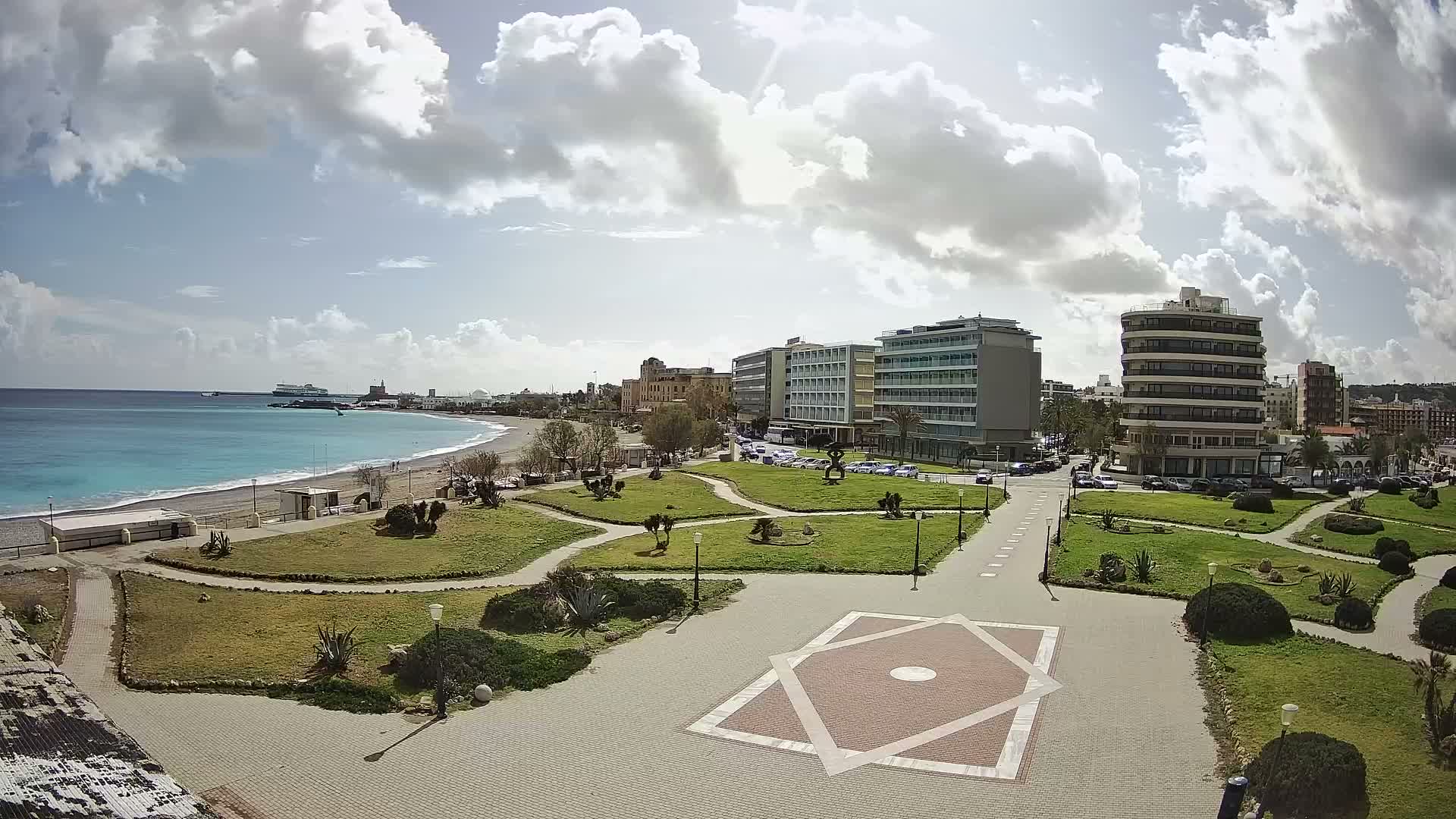 Rhodes, Paralia Enidriou Beach & Platia Enidriou Plaza Live Cam - Elli Beach, Rhodes (Ródos), Dodacanese, South Aegean (Periféreia Notíou Aigaíou), Greece