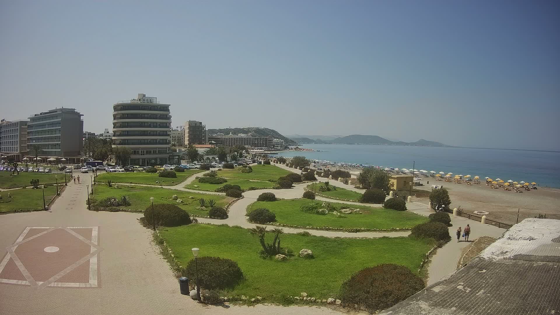 Rhodes, Paralia Elli Beach & Platia Enidriou Plaza Live Cam - Elli Beach, Rhodes (Ródos), Dodacanese, South Aegean (Periféreia Notíou Aigaíou), Greece