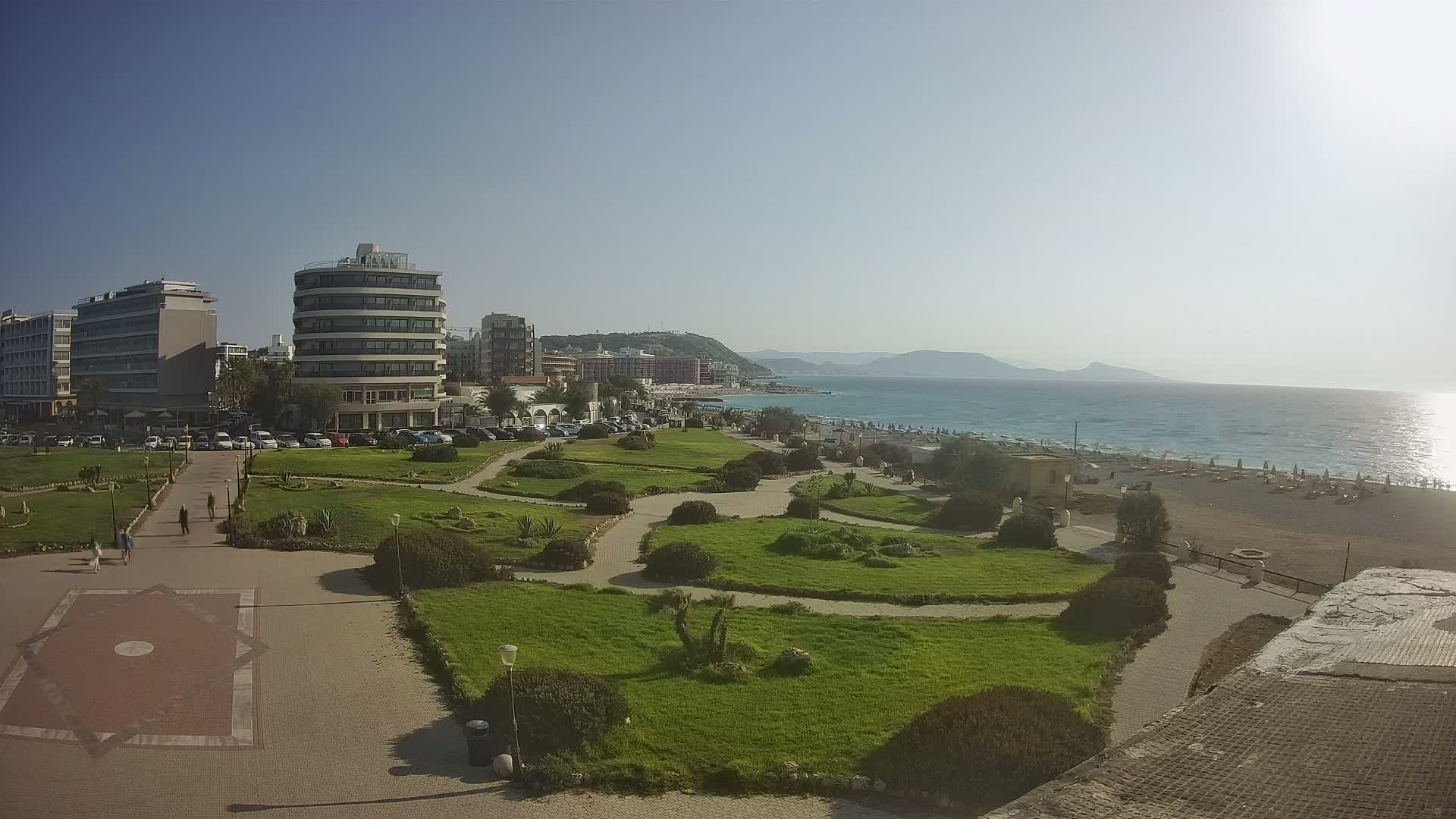 Rhodes, Paralia Elli Beach & Platia Enidriou Plaza Live Cam - Elli Beach, Rhodes (Ródos), Dodacanese, South Aegean (Periféreia Notíou Aigaíou), Greece